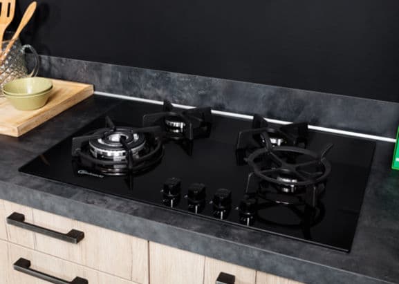 Modern gas burner and hob on a kitchen range